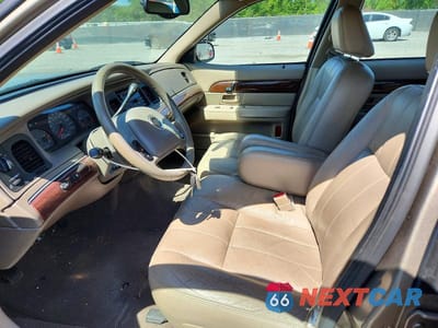 Zdjęcie 7 z 12 samochodu: 2003 MERCURY GRAND MARQUIS LS VIN:2MEFM75WX3X669997 - miniatura