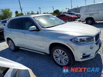 Czwarte zdjęcie samochodu z boku: 2017 BMW X5 XDR40E VIN:5UXKT0C33H0V95300 - miniatura