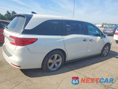 Trzecie zdjęcie samochodu z tyłu: 2020 HONDA ODYSSEY EXL VIN:5FNRL6H7XLB064054 - miniatura