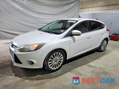 2012 FORD FOCUS TITANIUM 1FAHP3N25CL144954 - główne zdjęcie licytacji z USA - miniatura