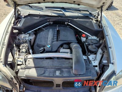 Zdjęcie 11 z 11 samochodu: 2013 BMW X5 XDRIVE35I VIN:5UXZV4C55D0B00450 - miniatura