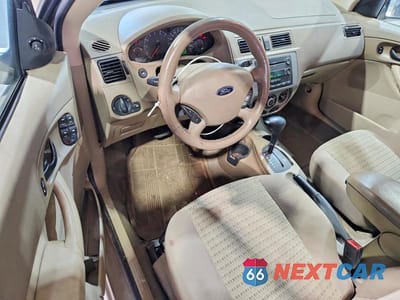 Zdjęcie 8 z 13 samochodu: 2005 FORD FOCUS ZXW VIN:1FAHP36N35W208077 - miniatura
