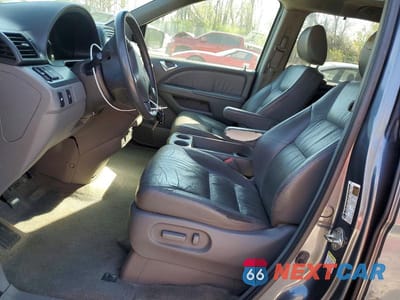 Zdjęcie 7 z 14 samochodu: 2010 HONDA ODYSSEY EXL VIN:5FNRL3H6XAB038458 - miniatura