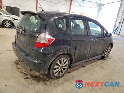 Trzecie zdjęcie samochodu z tyłu: 2013 HONDA FIT SPORT VIN:JHMGE8H51DC069846 - miniatura
