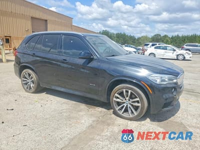 Czwarte zdjęcie samochodu z boku: 2015 BMW X5 XDRIVE50I VIN:5UXKR6C5XF0J74304 - miniatura