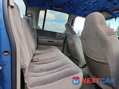 Zdjęcie 10 z 12 samochodu: 2004 DODGE DAKOTA QUAD SPORT VIN:1D7HL38N74S538643 - miniatura