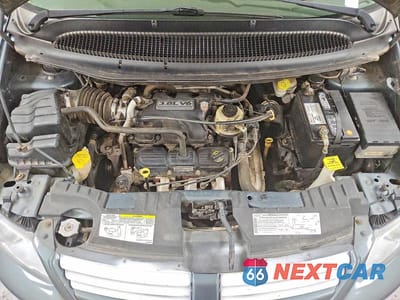 Zdjęcie 12 z 13 samochodu: 2006 DODGE GRAND CARAVAN SXT VIN:2D4GP44LX6R792875 - miniatura