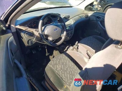 Zdjęcie 8 z 11 samochodu: 2002 FORD FOCUS ZX3 VIN:3FAFP31392R110490 - miniatura