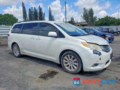 Czwarte zdjęcie samochodu z boku: 2011 TOYOTA SIENNA LIMITED 7-PASSENGER VIN:5TDYK3DC9BS017723 - miniatura