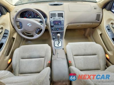 Zdjęcie 8 z 12 samochodu: 2003 NISSAN MAXIMA GXE VIN:JN1DA31D13T525270 - miniatura