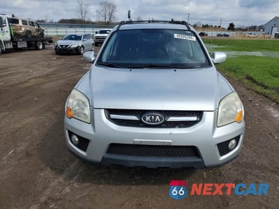 Piąte zdjęcie samochodu w środku: 2009 KIA SPORTAGE LX VIN:KNDJF723997613399 - miniatura