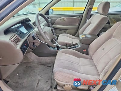 Zdjęcie 7 z 11 samochodu: 1998 TOYOTA CAMRY LE VIN:JT2BG22KXW0219449 - miniatura