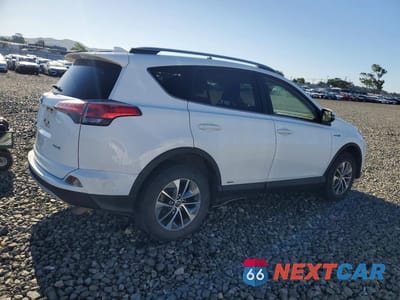 Trzecie zdjęcie samochodu z tyłu: 2018 TOYOTA RAV4 HYBRID LE VIN:JTMRJREV1JD179222 - miniatura
