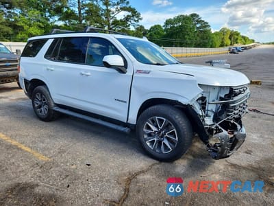 Czwarte zdjęcie samochodu z boku: 2021 CHEVROLET TAHOE K1500 Z71 VIN:1GNSKPKD4MR348047 - miniatura