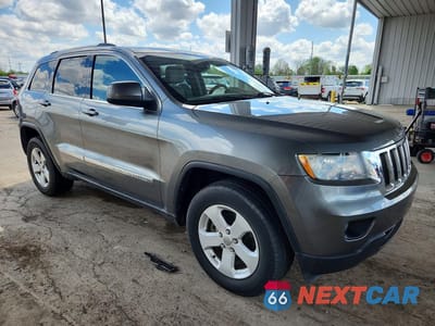 Czwarte zdjęcie samochodu z boku: 2011 JEEP GRAND CHEROKEE LAREDO VIN:1J4RR4GG5BC681260 - miniatura