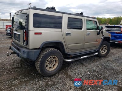 Trzecie zdjęcie samochodu z tyłu: 2004 HUMMER H2 VIN:5GRGN23U64H118618 - miniatura