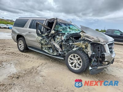 Czwarte zdjęcie samochodu z boku: 2019 GMC YUKON XL C1500 SLE VIN:1GKS1FKC9KR110256 - miniatura