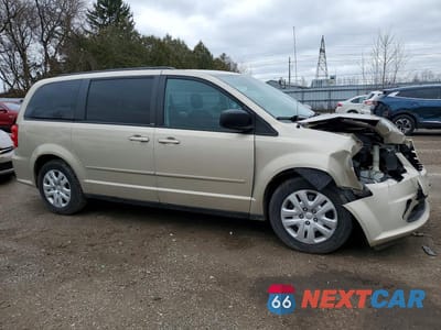 Czwarte zdjęcie samochodu z boku: 2014 DODGE GRAND CARAVAN SE VIN:2C4RDGBGXER109366 - miniatura