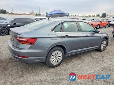 Trzecie zdjęcie samochodu z tyłu: 2019 VOLKSWAGEN JETTA S VIN:3VWC57BU7KM078473 - miniatura