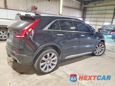 Trzecie zdjęcie samochodu z tyłu: 2020 CADILLAC XT4 PREMIUM LUXURY VIN:1GYFZDR41LF117949 - miniatura