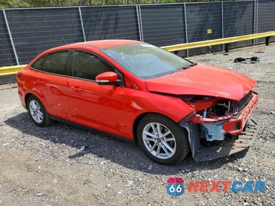 Czwarte zdjęcie samochodu z boku: 2016 FORD FOCUS SE VIN:1FADP3F2XGL402761 - miniatura