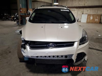 Piąte zdjęcie samochodu w środku: 2014 FORD ESCAPE TITANIUM VIN:1FMCU9J98EUA73034 - miniatura