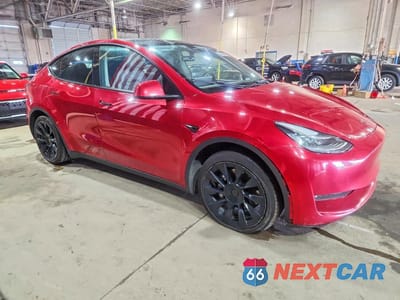 Czwarte zdjęcie samochodu z boku: 2022 TESLA MODEL Y VIN:7SAYGDEE8NF481850 - miniatura