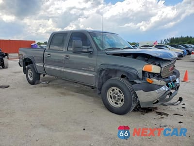 Czwarte zdjęcie samochodu z boku: 2002 GMC SIERRA K2500 HEAVY DUTY VIN:1GTHK23182F120545 - miniatura