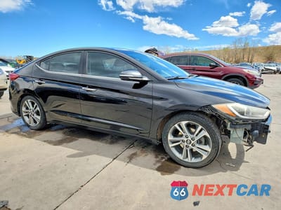 Czwarte zdjęcie samochodu z boku: 2017 HYUNDAI ELANTRA LIMITED VIN:KMHD84LF1HU146828 - miniatura