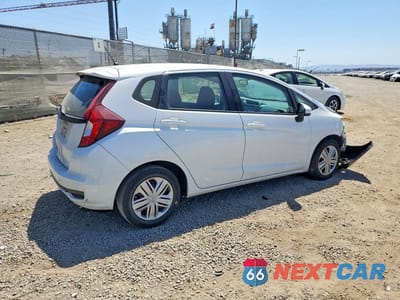 Trzecie zdjęcie samochodu z tyłu: 2020 HONDA FIT LX VIN:3HGGK5H4XLM709972 - miniatura