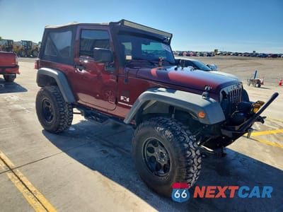 Czwarte zdjęcie samochodu z boku: 2009 JEEP WRANGLER X VIN:1J4FA24169L719734 - miniatura