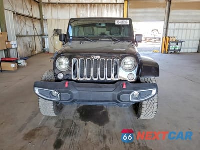 Piąte zdjęcie samochodu w środku: 2017 JEEP WRANGLER UNLIMITED SAHARA VIN:1C4BJWEG2HL752162 - miniatura