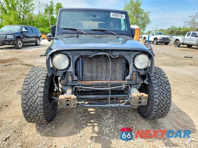 Piąte zdjęcie samochodu w środku: 2011 JEEP WRANGLER UNLIMITED SPORT VIN:1J4BA3H10BL585226 - miniatura