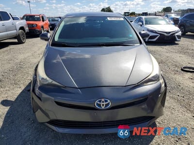 Piąte zdjęcie samochodu w środku: 2016 TOYOTA PRIUS TWO VIN:JTDKBRFU7G3016450 - miniatura