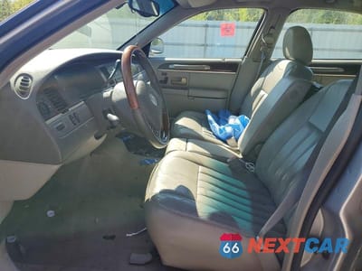 Zdjęcie 7 z 12 samochodu: 2003 LINCOLN TOWN CAR SIGNATURE VIN:1LNHM82W53Y613398 - miniatura