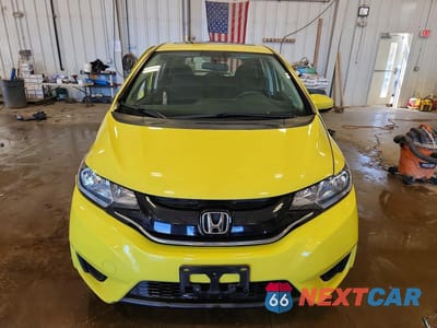 Piąte zdjęcie samochodu w środku: 2016 HONDA FIT EX VIN:JHMGK5H73GS009117 - miniatura
