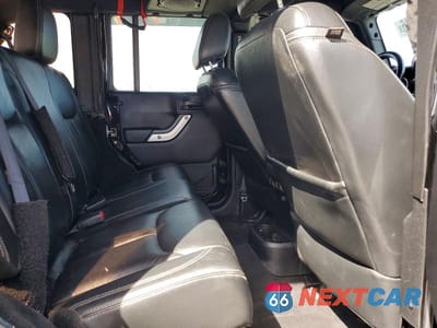 Zdjęcie 11 z 13 samochodu: 2014 JEEP WRANGLER UNLIMITED SAHARA VIN:1C4HJWEG0EL271977 - miniatura