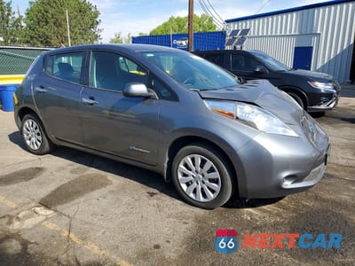 Czwarte zdjęcie samochodu z boku: 2015 NISSAN LEAF S VIN:1N4AZ0CP2FC310165 - miniatura