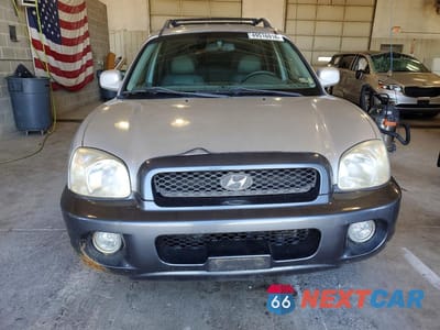 Piąte zdjęcie samochodu w środku: 2003 HYUNDAI SANTA FE GLS VIN:KM8SC13E33U534115 - miniatura