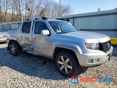 Czwarte zdjęcie samochodu z boku: 2014 HONDA RIDGELINE RTL-S VIN:5FPYK1F64EB014501 - miniatura