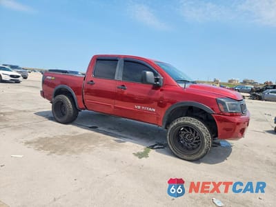 Czwarte zdjęcie samochodu z boku: 2014 NISSAN TITAN PRO-4X VIN:1N6BA0EC3EN508866 - miniatura