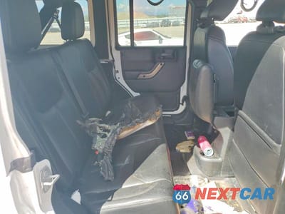 Zdjęcie 10 z 11 samochodu: 2018 JEEP WRANGLER UNLIMITED SAHARA VIN:1C4HJWEGXJL889768 - miniatura