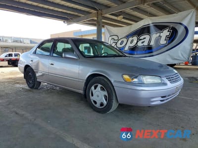 Czwarte zdjęcie samochodu z boku: 1997 TOYOTA CAMRY LE V6 VIN:JT2BF22K3V0010166 - miniatura