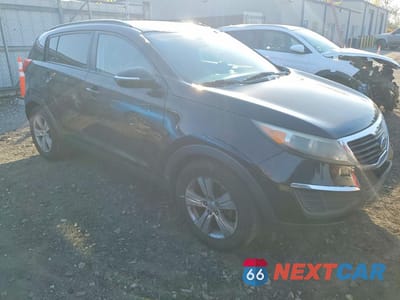 Czwarte zdjęcie samochodu z boku: 2011 KIA SPORTAGE LX VIN:KNDPB3A26B7041902 - miniatura