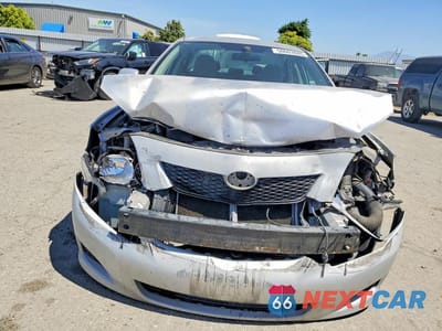 Piąte zdjęcie samochodu w środku: 2010 TOYOTA COROLLA LE VIN:1NXBU4EE0AZ181289 - miniatura