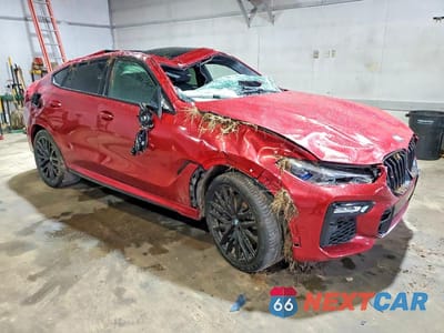 Czwarte zdjęcie samochodu z boku: 2021 BMW X6 M50I VIN:5UXCY8C08M9G97971 - miniatura