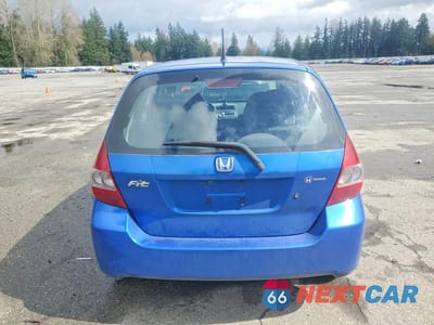 Zdjęcie 6 z 13 samochodu: 2007 HONDA FIT VIN:JHMGD38417S802906 - miniatura