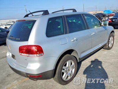 Trzecie zdjęcie samochodu z tyłu: 2006 VOLKSWAGEN TOUAREG 4.2 VIN:WVGZM77L16D054733 - miniatura