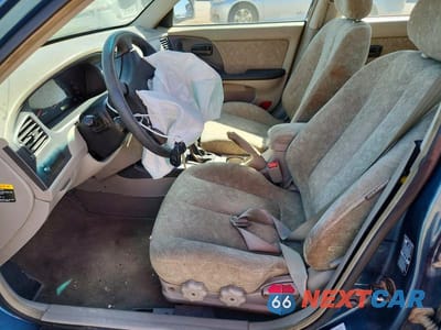 Zdjęcie 7 z 13 samochodu: 2002 HYUNDAI ELANTRA GLS VIN:KMHDN45D12U291413 - miniatura
