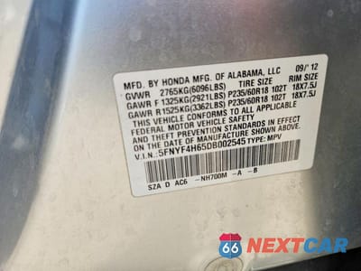 Zdjęcie 12 z 12 samochodu: 2013 HONDA PILOT EXL VIN:5FNYF4H65DB002545 - miniatura